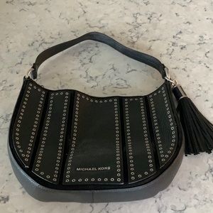 Michael Kors black leather grommet purse